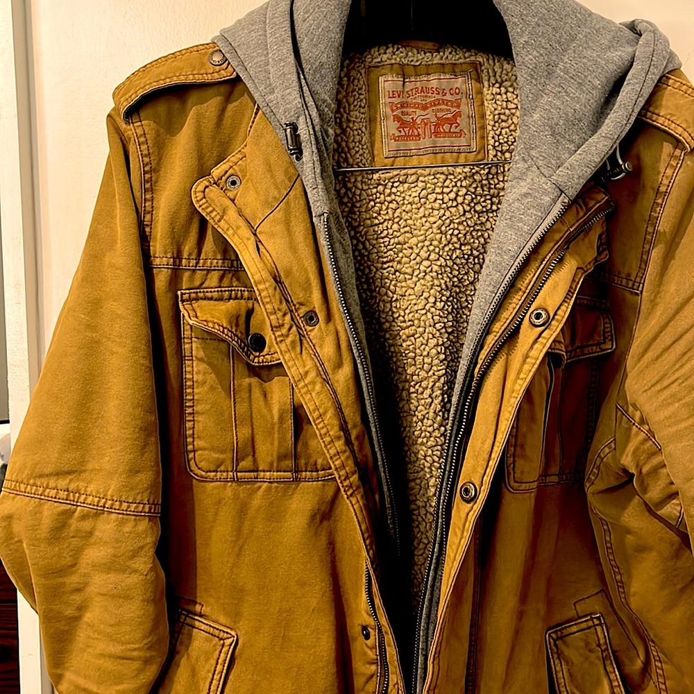 In style and goes with everything, not to mention how warm it keeps you.